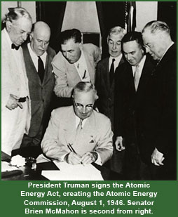 Truman Signs Energy Act
